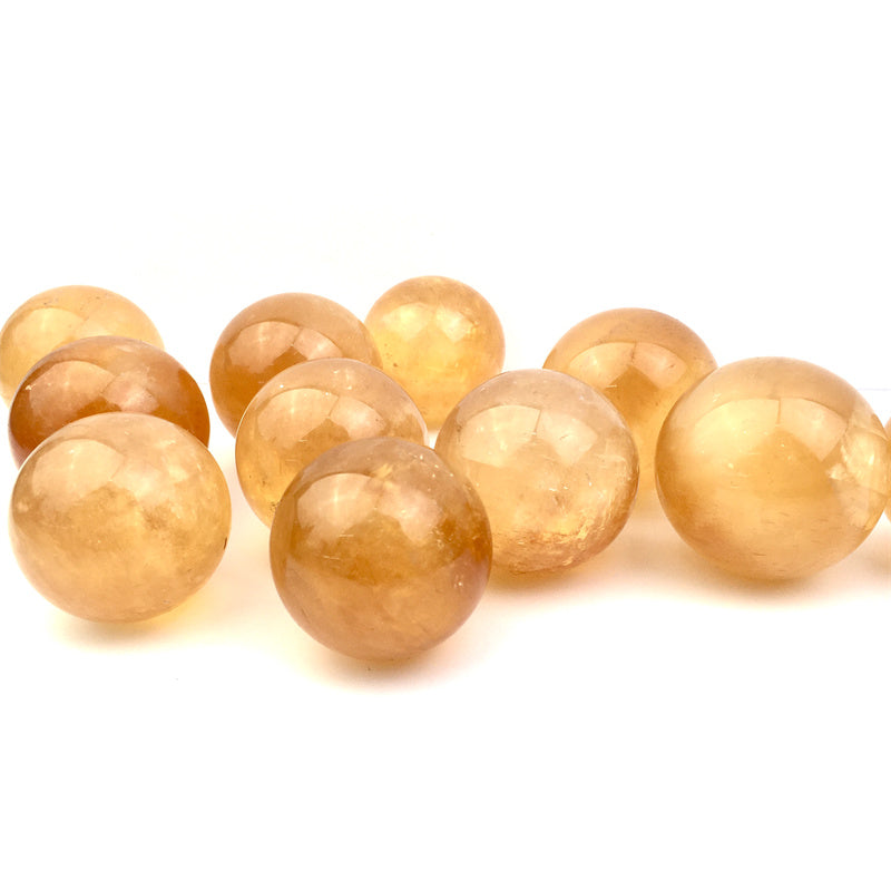 Wholesale Natural honey calcite crystal balls/sphere for decoraiotion 1kg