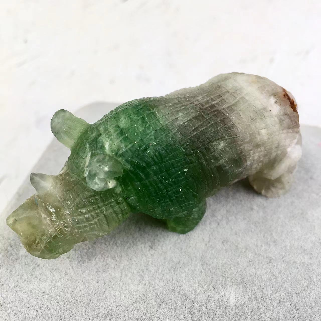 Wholesale Natural Crystal Carved Sculpture Caribbean calcite /fluorite Rhinoceros and Caribbean calcite penguin