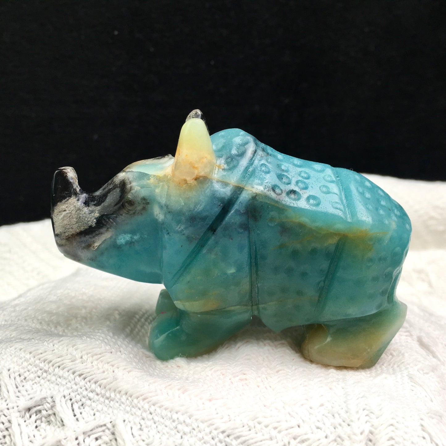Wholesale Natural Crystal Carved Sculpture Caribbean calcite /fluorite  Rhinoceros and Caribbean calcite penguin