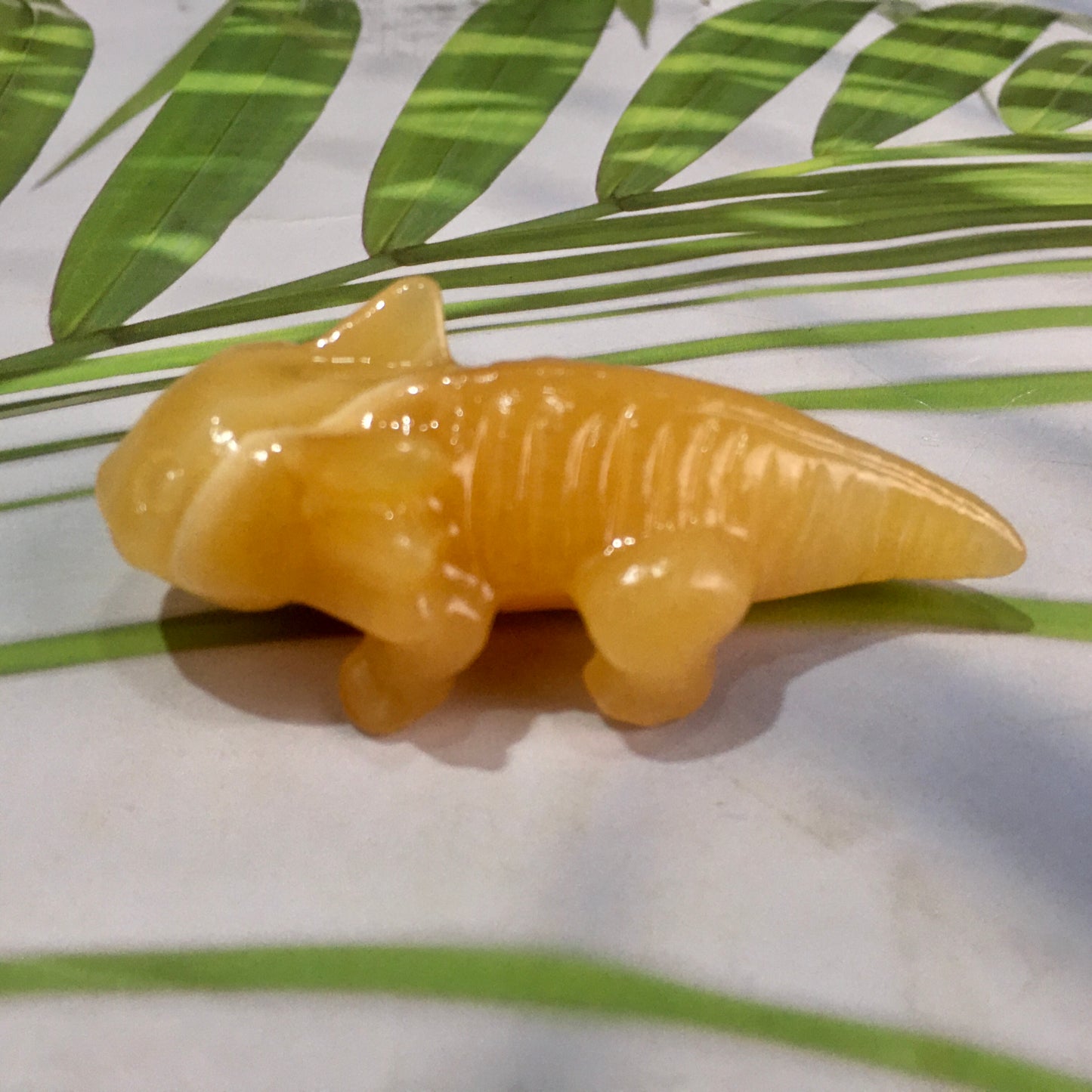 Wholesale high quality Orange calcite Giant salamander carving a for decoraiotion
